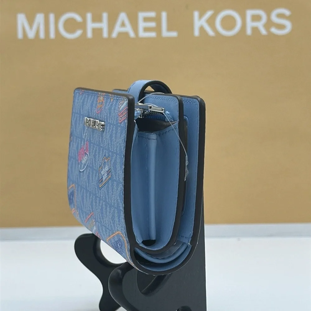 Michael Kors Jet Set Travel Medium Printed Signature Logo Bi-Fold Wallet LT SKY